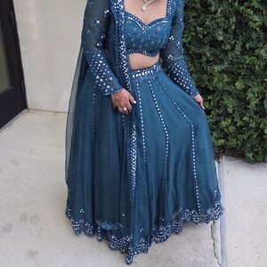 Vvani by Vani Vats Inspired Peacock Blue full mirror Lehenga Set